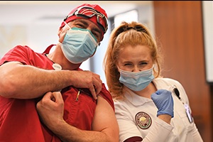 Nursing Students give vaccination