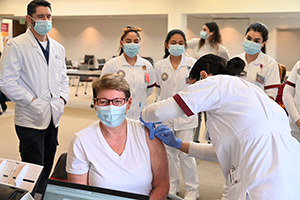 Nursing Students give vaccination