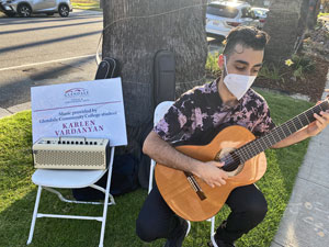 Building Bridges Through National Night Out, guitarist playing