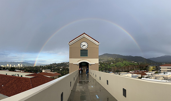 A rainbow over clock tower